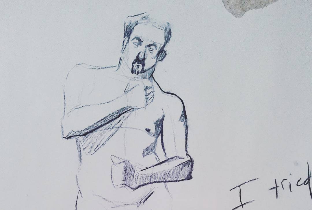 Charcoal life drawing of a standing figure